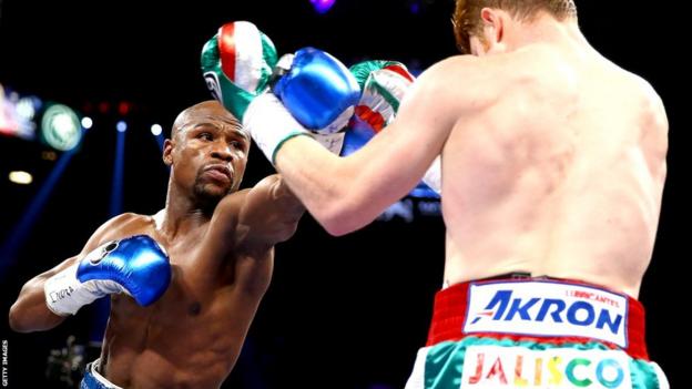 Floyd Mayweather connects against Saul Alvarez
