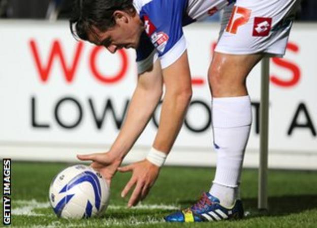 Joey Barton wears rainbow coloured shoe laces as part of a campiagn against homophobia