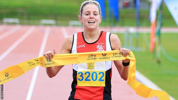 Aileen Reid crosses the line in the Belfast Half Marathon