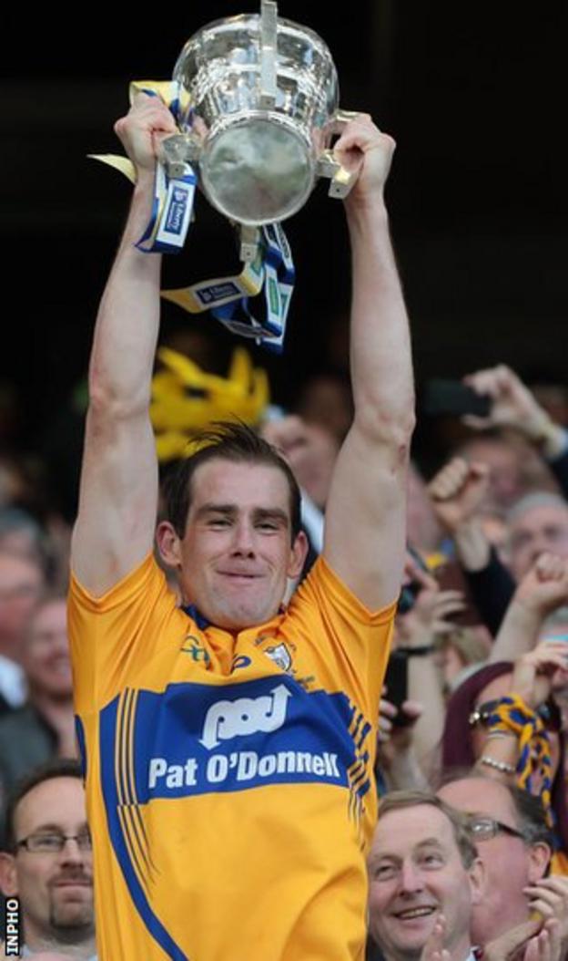 Clare captain Patrick Donnellan lifts the Liam McCarthy Cup