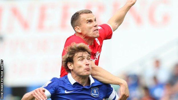Ben Turner challenges for a high ball