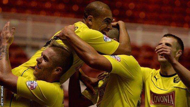 James Vaughan celebrates opening the scoring for Huddersfield