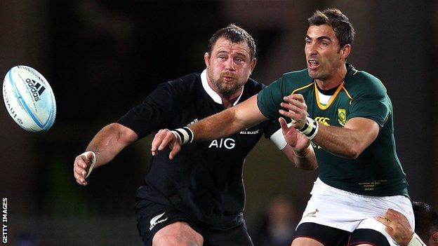Ruan Pienaar battles with New Zealand's Tony Woodcock in the recent Rugby Championship clash