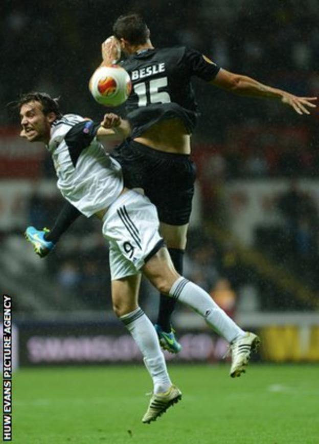 Michu battles for the ball with St Gallen's Stephane Besle