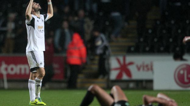 Swansea City's Jordi Amat shows his relief at the final whistle of their 1-0 win over St Gallen at the Liberty Stadium