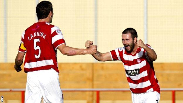 James Keatings celebrates with Hamilton team-mate Martin Canning after scoring against Livingston