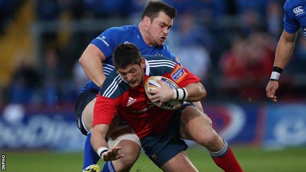 Munster's James Downey and Leinster's Cian Healy