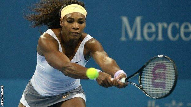 Serena Williams plays a shot in the China Open final