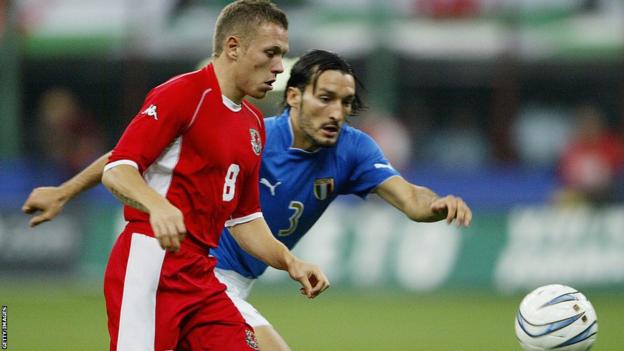 Bellamy battles with Italy’s Gianluca Zambrotta during Wales’ Euro 2004 qualifying defeat at the San Siro. Bellamy was sidelined as Wales' qualification hopes were ended by Russia in the play-offs