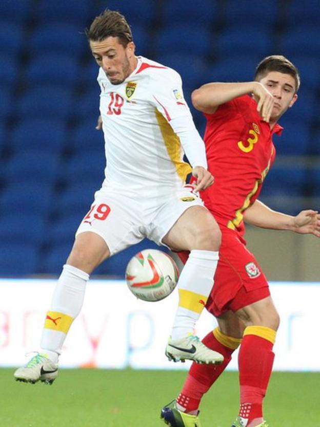 Declan John and Macedonia's Agim Ibraimi battle for the ball