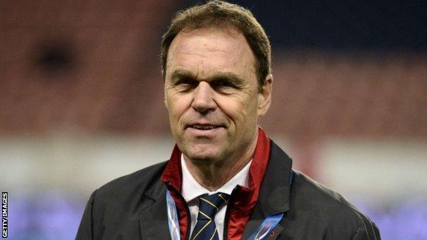 Australia"s head coach Holger Osieck waits for the beginning of their match with France