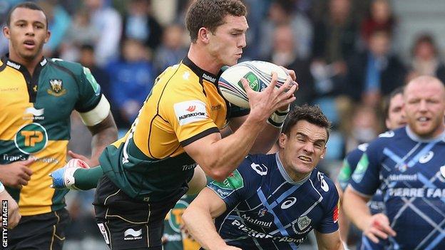 Northampton wing George North claims a high ball above Castres' Max Evans
