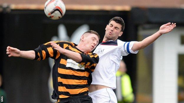 Alloa's Declan McManus and Falkirk's Jonathan Flynn