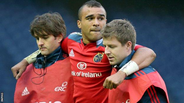 Simon Zebo is helped off the pitch after suffering the foot injury
