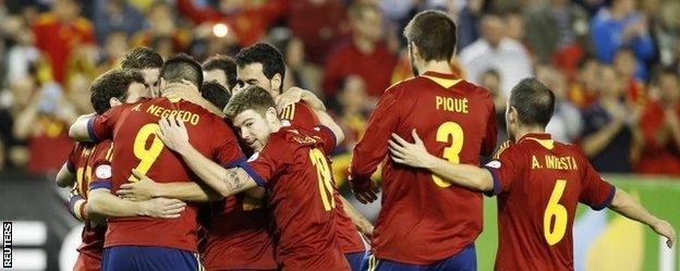 Spain celebrate Juan Mata's goal against Georgia