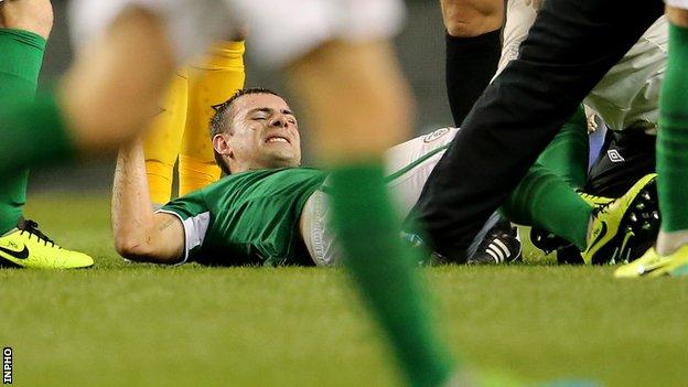 Darron Gibson looks in pain after being injured during the Republic of Ireland's game against Kazakhstan