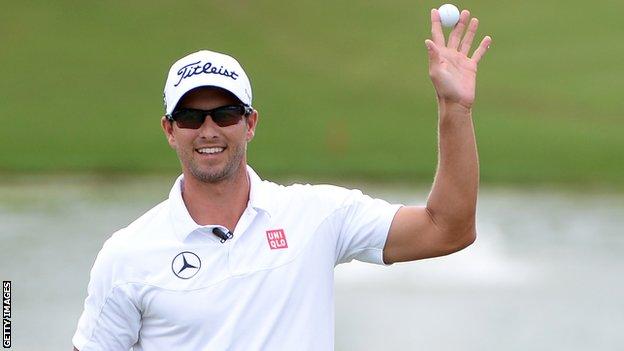 Adam Scott celebrates winning the PGA Grand Slam of Golf