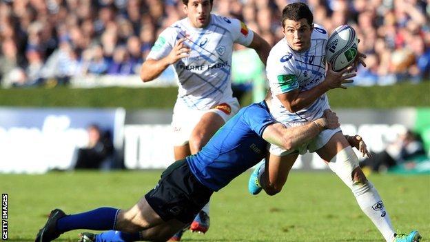 Leinster centre Gordon D'Arcy tackles Castres full-back Brice Dulin