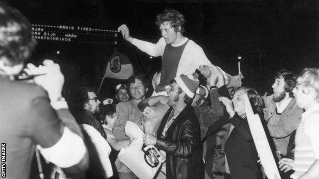 Ajax defender Arie Haan is held aloft by fans after the 1971 European Cup final