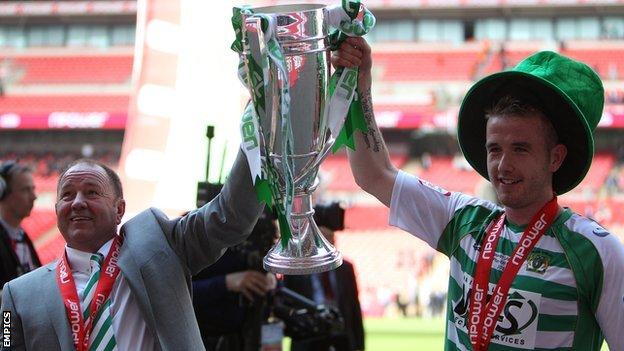 Yeovil's Gary Johnson and Paddy Madden lift the League One play-off trophy