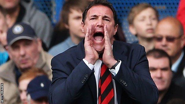 Malky Mackay shouts instructions to his players from the touchline