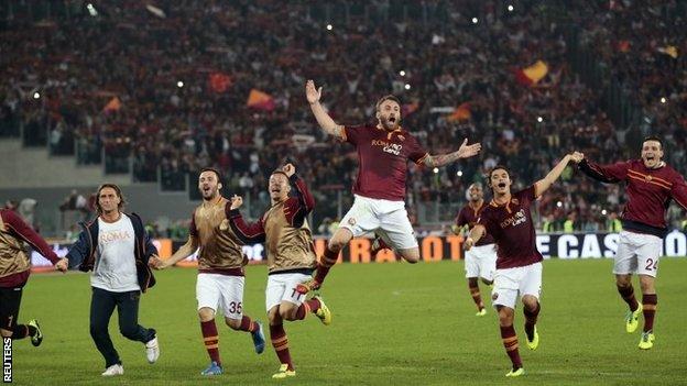 Roma players celebrate