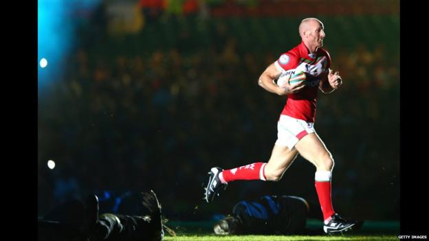 Former Wales rugby union captain and rugby league convert Gareth Thomas makes an appearance at the World Cup opening ceremony