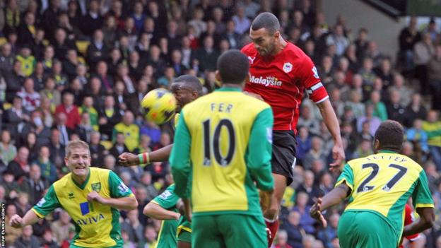 Cardiff City defender Steven Caulker goes close to scoring against Norwich City with a header
