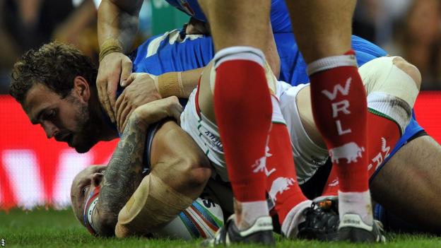 Joshua Mantellato scores a try for Italy, who dominate the second half at the Millennium Stadium to beat Wales 32-16