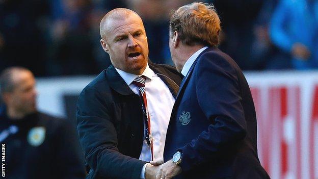 Sean Dyche shakes hands with Harry Redknapp after Burnley's win over QPR