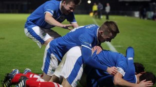 Linfield celebrate scoring against Cliftonville in County Antrim Shield semi-final