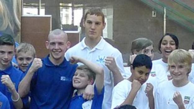Joe Ham and Scott Forrest pose for a photo after sparring with school pupils at BBC Scotland