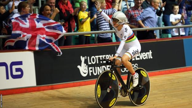 Elinor Barker celebrates after setting a new world record time as Great Britain's women win the team pursuit at the Track Cycling World Cup in Manchester.