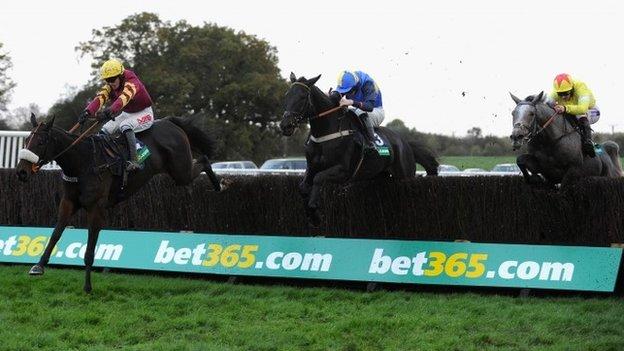 Harry Topper leads the Charlie Hall Chase field at Wetherby