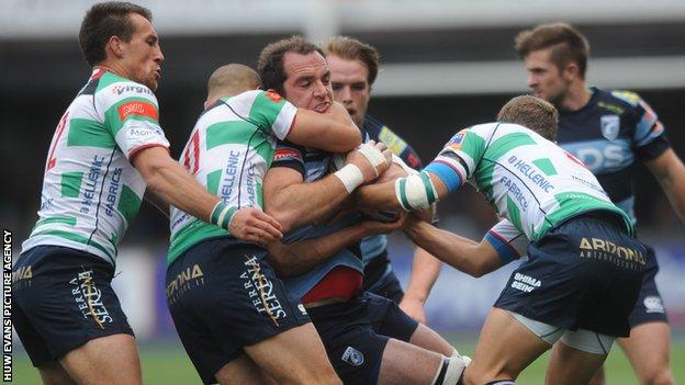 Cardiff Blues forward Lou Reed is stopped by the Treviso defence