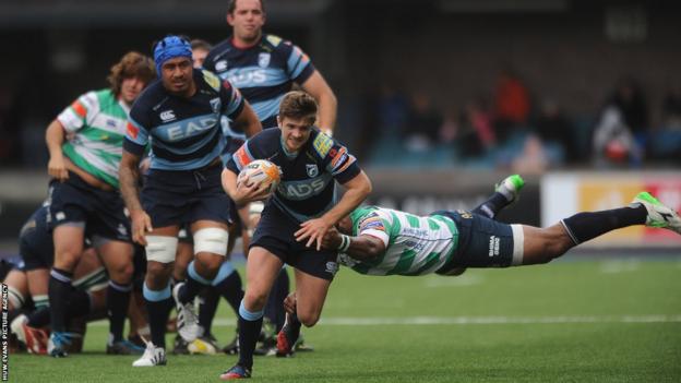 Lewis Jones of Cardiff Blues is tackled by Mano Vosawai of Benetton Treviso