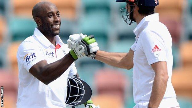 Michael Carberry is congratulated by England captain Alastair Cook