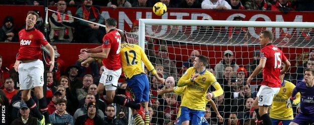 Robin van Persie scores Manchester United's winning goal against Arsenal