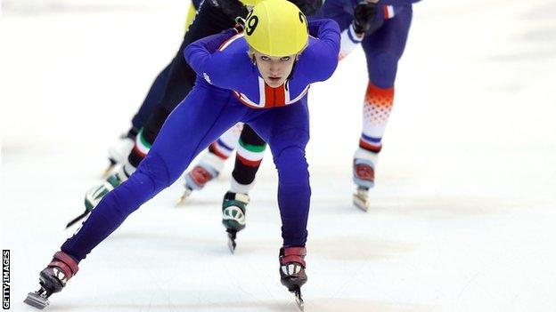 Elise Christie in action in Turin