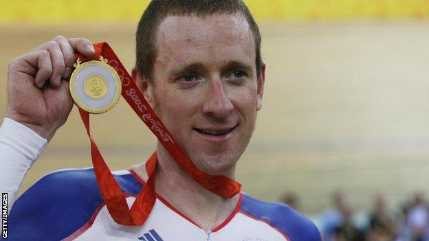 Sir Bradley Wiggins with his individual pursuit gold medal at the 2008 Beijing Olympics