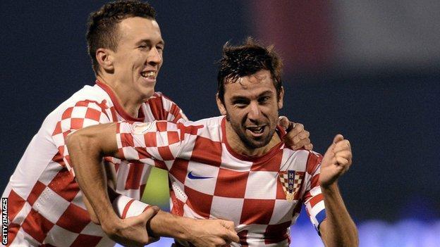 Darijo Srna (right) celebrates scoring the second goal with Ivan Perisic