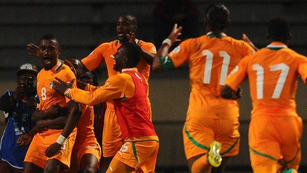 Ivory Coast celebrate scoring against Senegal in their World Cup play-off
