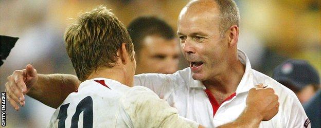 Clive Woodward hugs Jonny Wilkinson in celebration after England win the World Cup