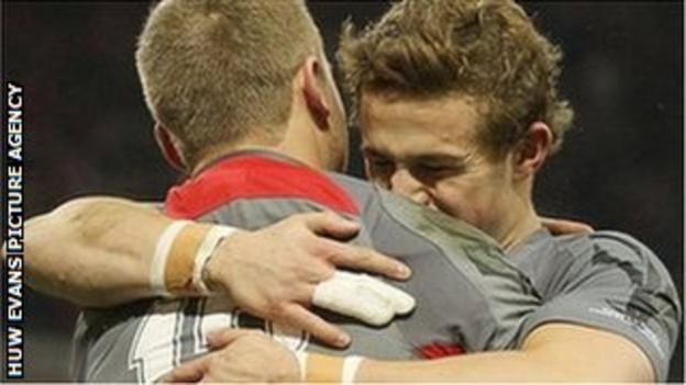 Owen Williams is congratulated by debutant Hallam Amos after scoring Wales's first try against Tonga.