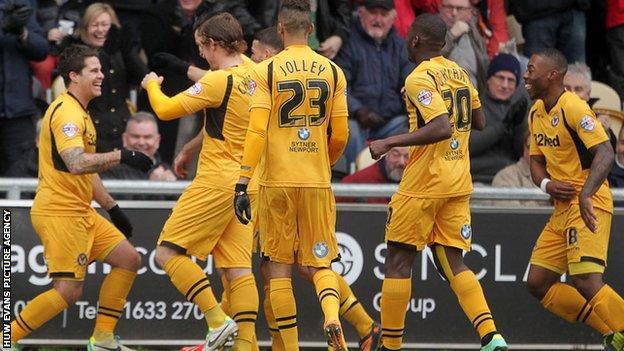 Newport celebrate their opening goal against Chesterfield