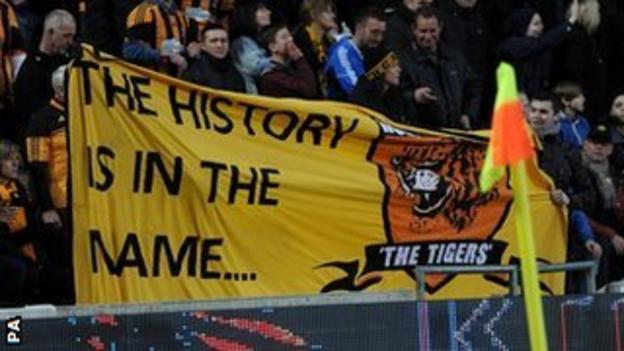 Hull City fans display a banner