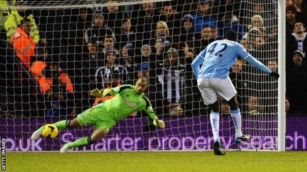 Yaya Toure scores Manchester City's third goal from the spot