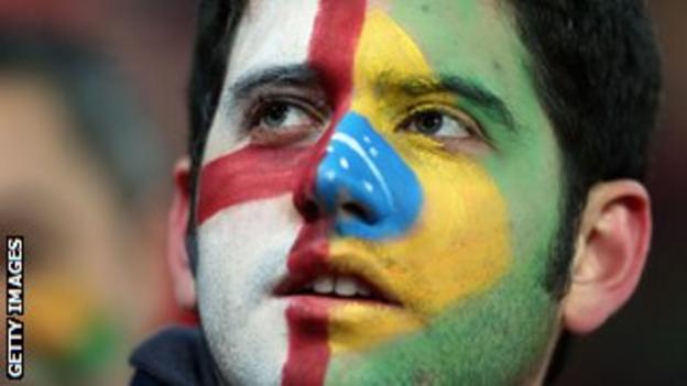 A fan sporting an England and Brazil face paint at the friendly between England and Brazil.