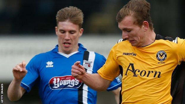 Grimsby's Dayle Southwell and Newport's Alex Gilby