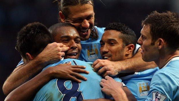 Manchester City players celebrate during win over Arsenal